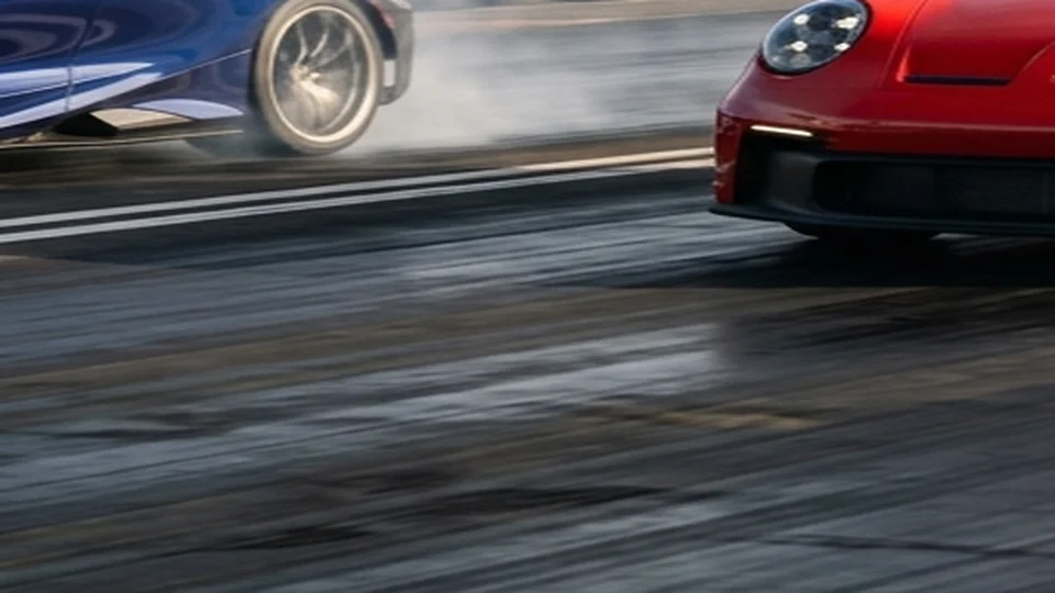Lightweight sports coupe accelerating smoothly down paved proving ground runway
